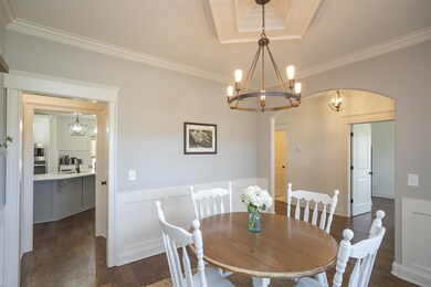 Classic crown molding, wainscoting, and a beautifu