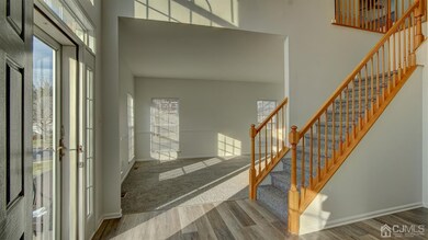 2 story foyer with new flooring.