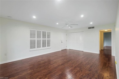Unfurnished living room with ceiling fan, wood-type flooring, and recessed lighting