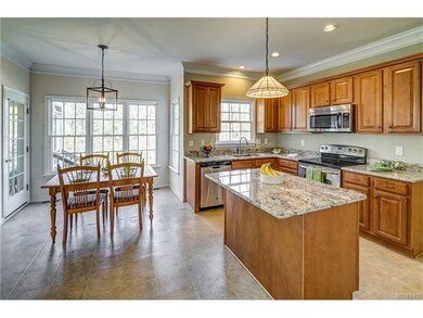 Breakfast area, island,  Door to screen porch.