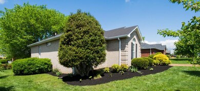 Home is all brick and situated on corner lot