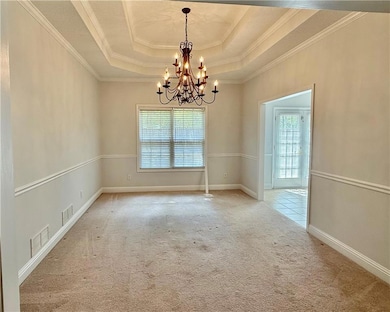 Large dining room with Tray Ceilings