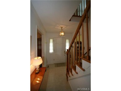 Entrance hall features front door side lights and 