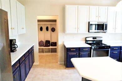Custom kitchen with stainless appliances