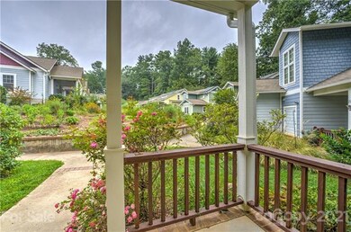 The front porch looks out into the garden area