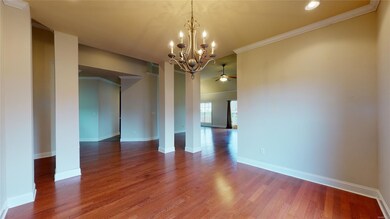 Another view of Dining Room open to Den