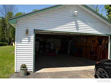 Exterior Front AWESOME garage with 220 line