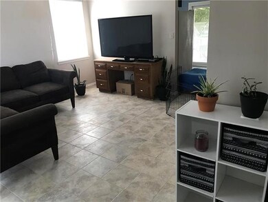 Entering from the front door, view of living room.