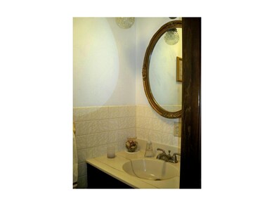 MAIN FLOOR HALF BATH w/NEWER TILE FLOOR