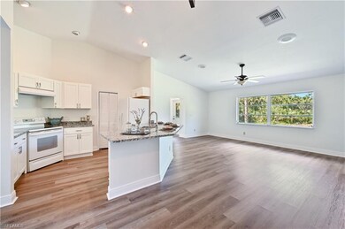 321 13th St SW, Naples, FL 34117 - photo 2