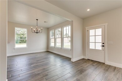 The dining room is open to both the living room an