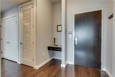 View of entrance to unit. The area to the left of the door is perfect for catching keys as you enter.