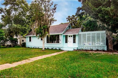 703 N Saint Clair Abrams Ave, Tavares, FL 32778 - photo 2