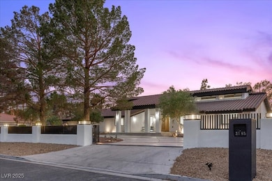 View of front facade with a fenced front yard, stu