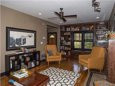 The living room features built-in