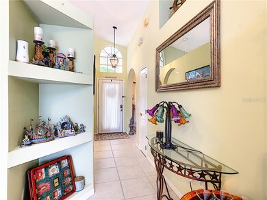 Entry hall with storage closet and built in shelve