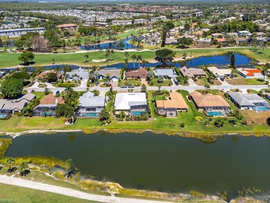 Aerial view with a water view and a residential vi