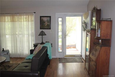 Front Foyer area with Glass Storm Door & Side Ligh