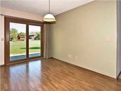 Casual dining space in the kitchen has beautiful w