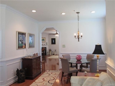 Dining room - wood floors and picture frame moldin