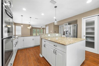 Kitchen with appliances with stainless steel fini