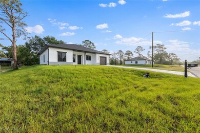 View of front of house with an attached garage, st