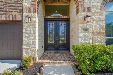 The grand arched, covered main entrance, with double mahogany doors, is embraced by artisan-like stone elevation. Inside, are 4 bedrooms, 3 full baths, all occupying a 13,796 square-foot-lot with 3,341 square-feet of interior living space.