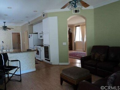 View from Family Room into Kitchen and Archway int