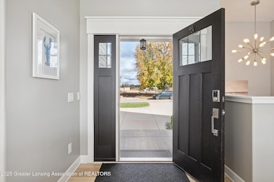 411 Bubbling Springs Ct, Mason, MI 48854 - photo 4