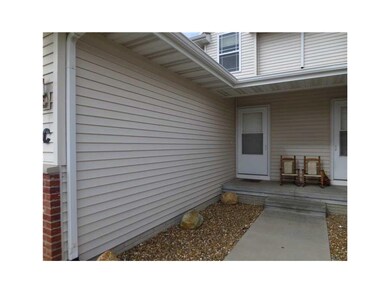 Front Exterior. Nice covered entrance.