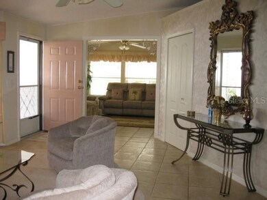 FOYER, LIVING ROOM AND SITTING ROOM