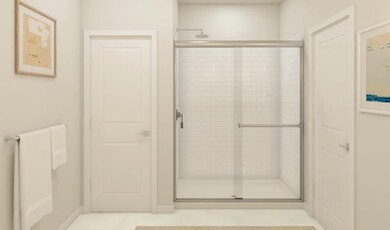Primary bath with glass shower enclosure