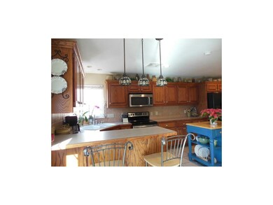 Kitchen filled with cabinets.