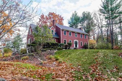 Perched on a lovely landscaped lot