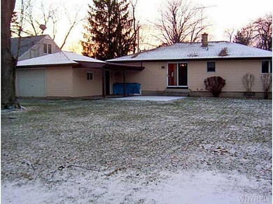 Exterior Back. Back and sides are all maintainence