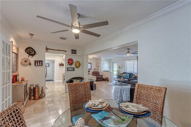 Dining room is spacious with travertine flooring
