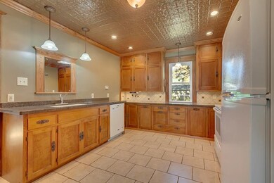 Original cabinets, tip out flour drawers, granite 