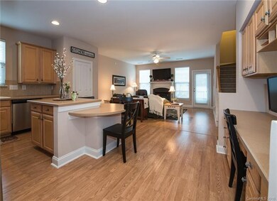 Inviting kitchen with new SS appliances and a buil
