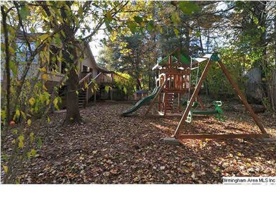 Side view of fenced in backyard.
