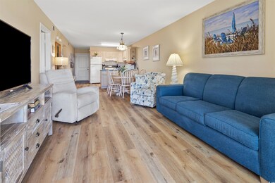 Living room with light wood-type flooring