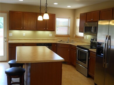The gourmet kitchen with matching Whirlpool stainl