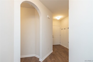 Looking at the door to exit the condo.
