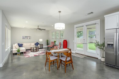 Dining room featuring french doors, baseboards, h