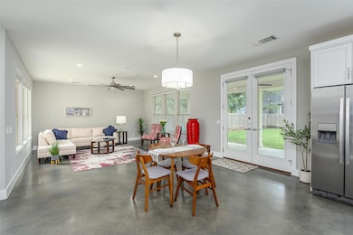 Dining room featuring french doors, baseboards, h