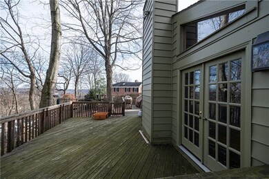 The deck puts you in the treetops, offering privac