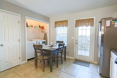 Laundry is located off breakfast nook