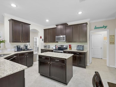 The kitchen is in the heart of this open floor plan home.