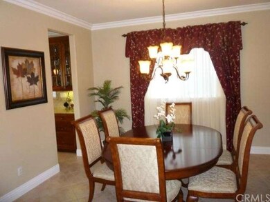 3rd room used as formal dining room.  Shows crown 