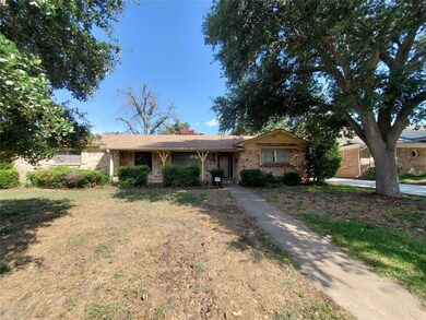 Single story home featuring a front yard