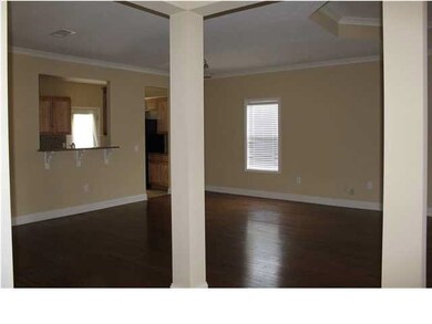Dining area also has hardwood floors.